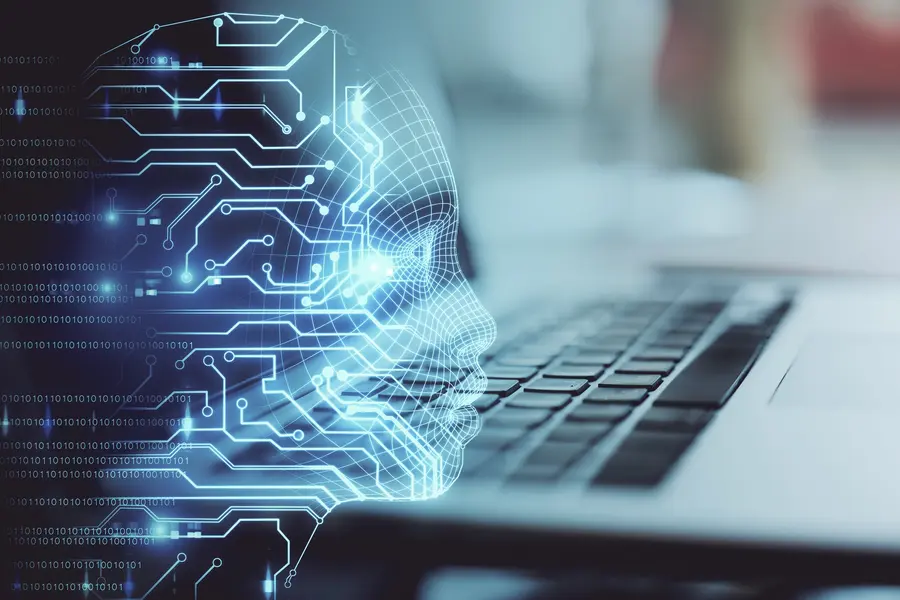 Digital wireframe face rendered over a computer keyboard, representing AI-driven automation